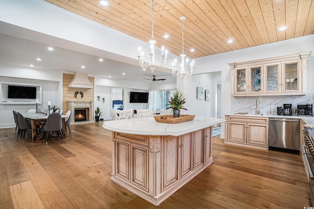 139 Pioneer Loop, Georgetown, SC 29440 - kitchen with stainless steel dishwasher, open floor plan, hardwood / wood-style flooring, recessed lighting, and tasteful backsplash