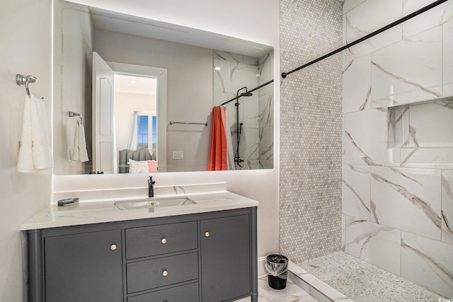 139 Pioneer Loop, Georgetown, SC 29440 - full bathroom featuring a marble finish shower, vanity, and marble look tile flooring