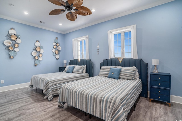 139 Pioneer Loop, Georgetown, SC 29440 - bedroom with wood finished floors, crown molding, a ceiling fan, and recessed lighting