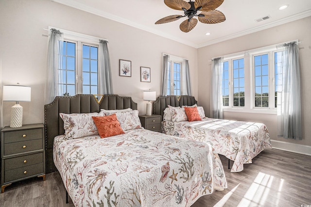 139 Pioneer Loop, Georgetown, SC 29440 - bedroom featuring dark wood-style floors, crown molding, a ceiling fan, and recessed lighting
