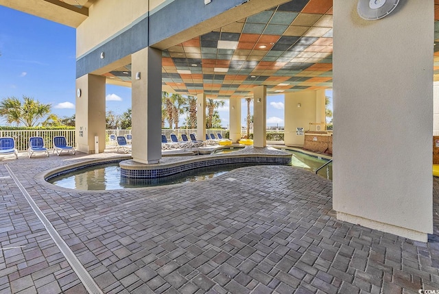 2504 N Ocean Blvd Unit 2030, Myrtle Beach, SC 29577 - indoor community pool featuring exterior kitchen and a patio