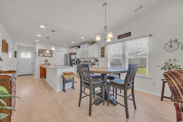 132 Machrie Loop Unit A, Myrtle Beach, SC 29588 - dining room with light wood finished floors, a chandelier, recessed lighting, and baseboards