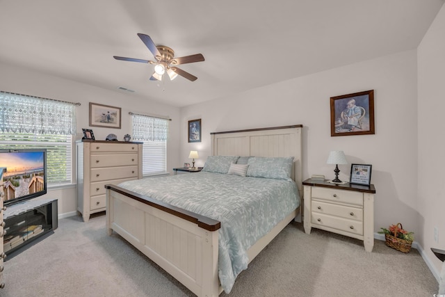 132 Machrie Loop Unit A, Myrtle Beach, SC 29588 - bedroom featuring light colored carpet, ceiling fan, and baseboards