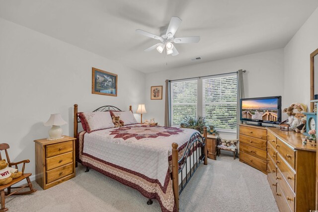 132 Machrie Loop Unit A, Myrtle Beach, SC 29588 - bedroom with light colored carpet and ceiling fan