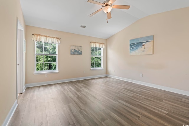 278 Carolina Crossing Blvd, Little River, SC 29566 - unfurnished room with wood finished floors, vaulted ceiling, and a ceiling fan