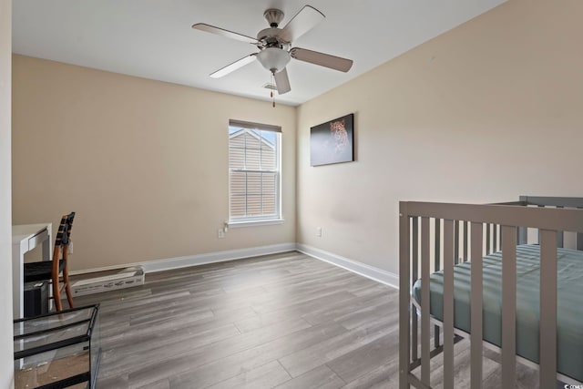 278 Carolina Crossing Blvd, Little River, SC 29566 - unfurnished bedroom with wood finished floors and ceiling fan