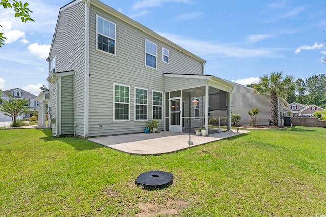278 Carolina Crossing Blvd, Little River, SC 29566 - back of house featuring a patio, a sunroom, and a yard