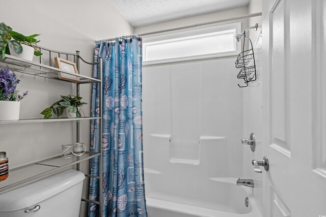 990 Chateau Dr, Conway, SC 29526 - full bath featuring shower / bath combination with curtain, toilet, and a textured ceiling