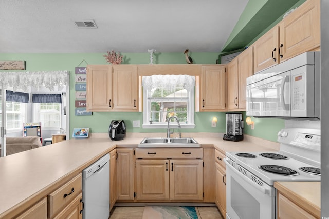 990 Chateau Dr, Conway, SC 29526 - kitchen featuring white appliances, a sink, light brown cabinets, light countertops, and light tile patterned floors