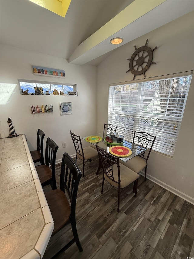 6001-Z67 S Kings Hwy, Myrtle Beach, SC 29575 - dining space featuring lofted ceiling, dark wood-style floors, and baseboards