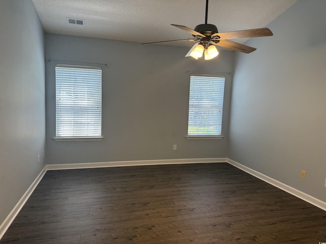 152 Rose Water Loop, Myrtle Beach, SC 29588 - spare room featuring a ceiling fan, dark wood-type flooring, a textured ceiling, and baseboards