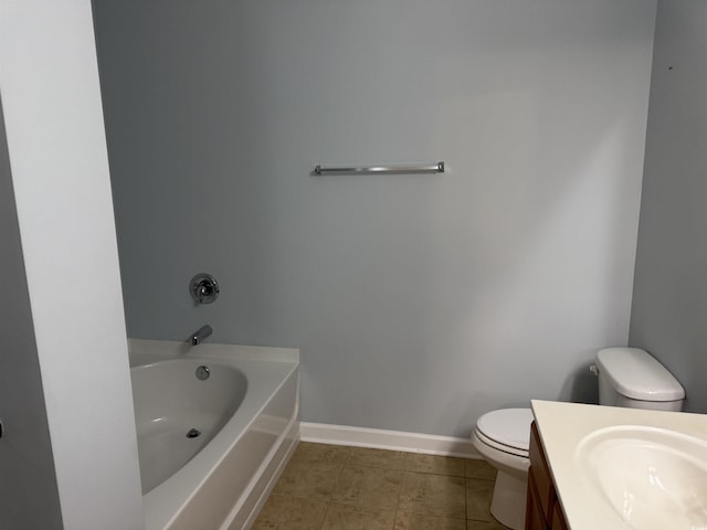152 Rose Water Loop, Myrtle Beach, SC 29588 - bathroom featuring toilet, a tub, tile patterned flooring, vanity, and baseboards