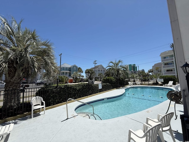 1509 N Waccamaw Dr Unit 112, Murrells Inlet, SC 29576 - community pool featuring a patio area