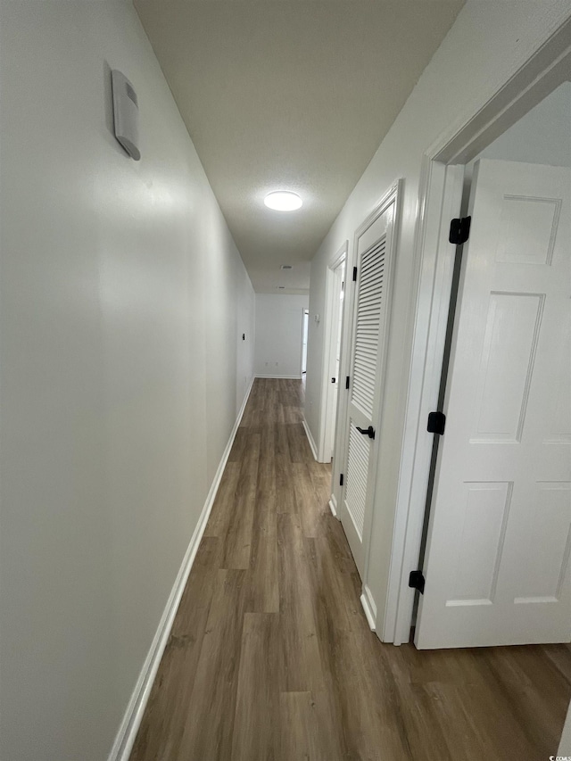 1509 N Waccamaw Dr Unit 112, Murrells Inlet, SC 29576 - hall featuring wood finished floors and baseboards