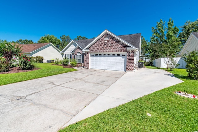 359 Harbour Reef Dr, Myrtle Beach, SC 29588 - traditional home featuring brick siding, an attached garage, and driveway
