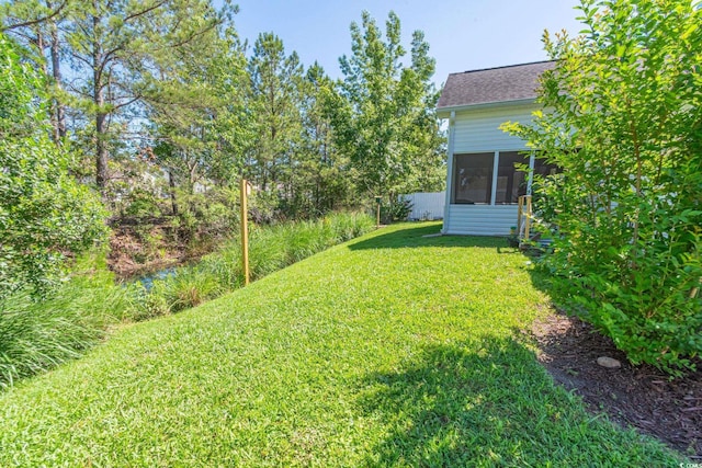 359 Harbour Reef Dr, Myrtle Beach, SC 29588 - view of grassy yard featuring a sunroom