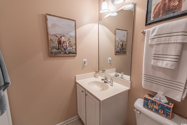 359 Harbour Reef Dr, Myrtle Beach, SC 29588 - half bathroom featuring vanity, toilet, and baseboards