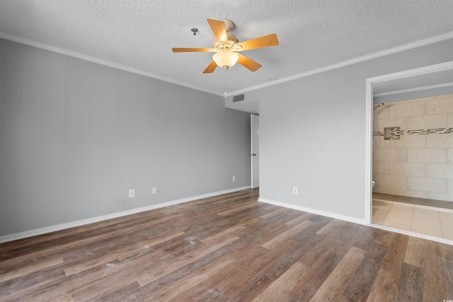 4350 Intercoastal Dr Unit 2408, Little River, SC 29566 - unfurnished bedroom featuring wood finished floors, a textured ceiling, baseboards, connected bathroom, and ornamental molding