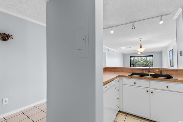 4350 Intercoastal Dr Unit 2408, Little River, SC 29566 - kitchen with dishwasher, a textured ceiling, a sink, ornamental molding, and light tile patterned floors
