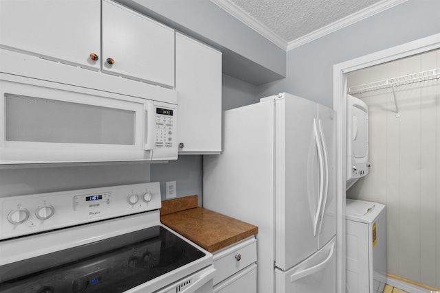 4350 Intercoastal Dr Unit 2408, Little River, SC 29566 - laundry room featuring estacked washer and dryer, a textured ceiling, and ornamental molding