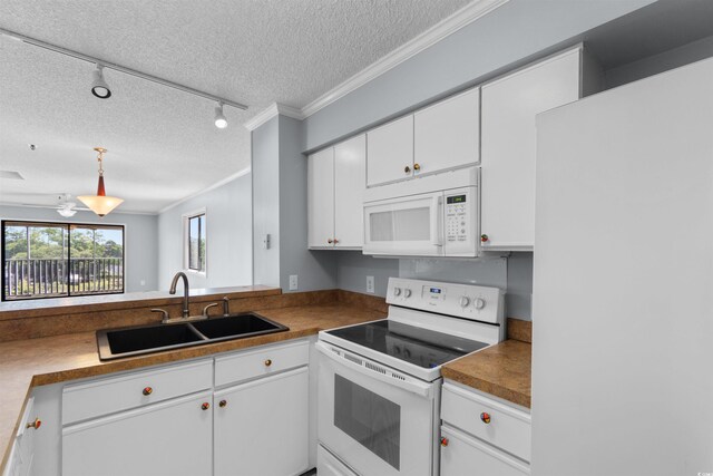 4350 Intercoastal Dr Unit 2408, Little River, SC 29566 - kitchen with white appliances, a sink, a textured ceiling, ornamental molding, and track lighting