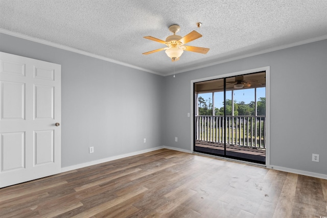 4350 Intercoastal Dr Unit 2408, Little River, SC 29566 - spare room with ceiling fan, wood finished floors, a textured ceiling, crown molding, and baseboards