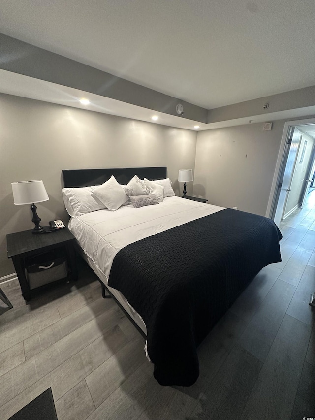 1501 S Ocean Blvd Unit 239, Myrtle Beach, SC 29577 - bedroom featuring wood finished floors and recessed lighting