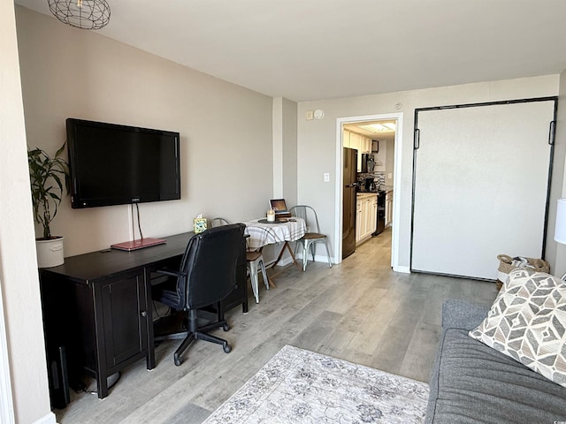 1501 S Ocean Blvd Unit 239, Myrtle Beach, SC 29577 - office area featuring light wood finished floors and baseboards