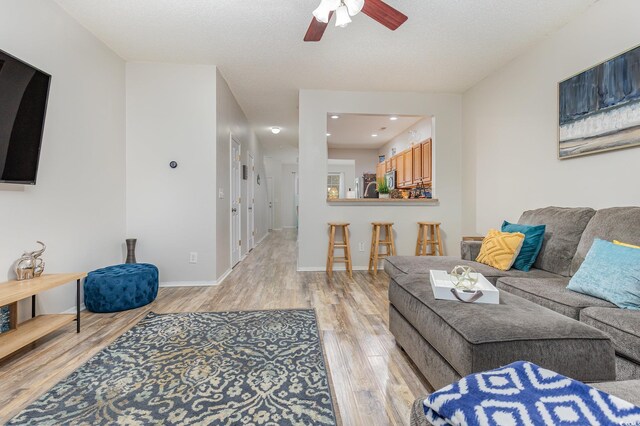310 Kiskadee Loop Unit D, Conway, SC 29526 - living area featuring light wood-style flooring, ceiling fan, and recessed lighting