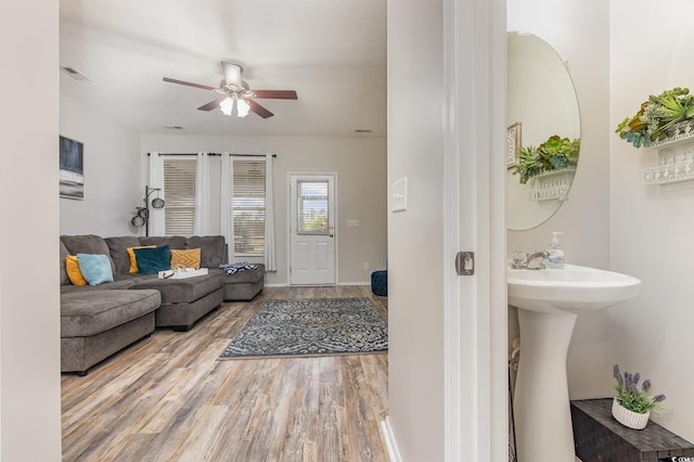 310 Kiskadee Loop Unit D, Conway, SC 29526 - living area featuring wood finished floors and ceiling fan