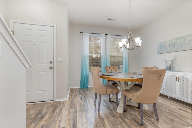 310 Kiskadee Loop Unit D, Conway, SC 29526 - dining area featuring a chandelier and wood finished floors