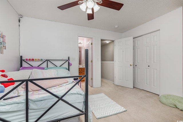 310 Kiskadee Loop Unit D, Conway, SC 29526 - bedroom with light colored carpet, a closet, ceiling fan, and ensuite bath