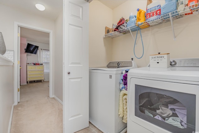 310 Kiskadee Loop Unit D, Conway, SC 29526 - laundry room with washing machine and clothes dryer and light colored carpet