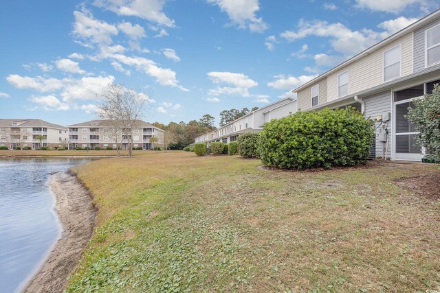 310 Kiskadee Loop Unit D, Conway, SC 29526 - view of green lawn featuring a residential view and a water view