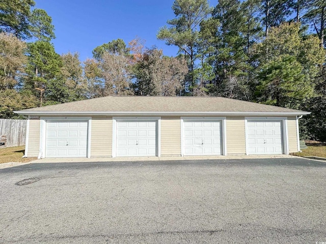 310 Kiskadee Loop Unit D, Conway, SC 29526 - garage featuring view of scattered trees