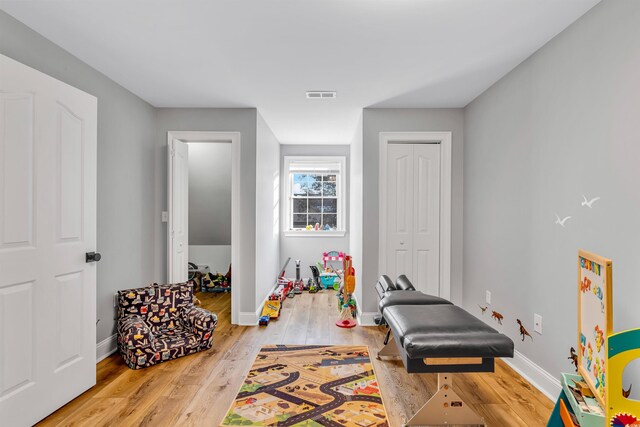 2150 N Berwick Dr, Myrtle Beach, SC 29575 - recreation room with light wood-type flooring and baseboards
