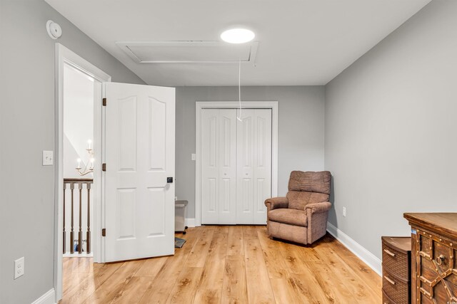 2150 N Berwick Dr, Myrtle Beach, SC 29575 - sitting room featuring attic access, light wood-style flooring, and baseboards