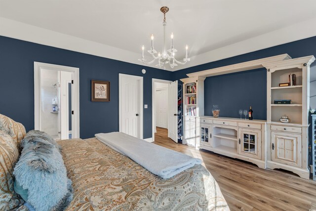 2150 N Berwick Dr, Myrtle Beach, SC 29575 - bedroom featuring a chandelier and wood finished floors