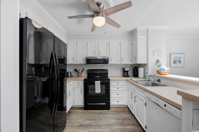 208 Ocean Blvd N Unit 324, North Myrtle Beach, SC 29582 - kitchen featuring black appliances, a sink, ceiling fan, a textured ceiling, and light countertops