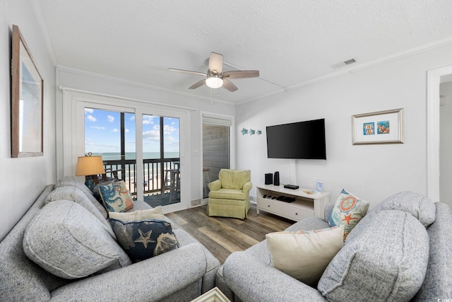 208 Ocean Blvd N Unit 324, North Myrtle Beach, SC 29582 - living area with crown molding, a ceiling fan, wood finished floors, and a textured ceiling