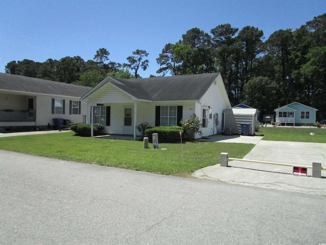 811 Rogers Rd, Myrtle Beach, SC 29577 - single story home featuring a front yard