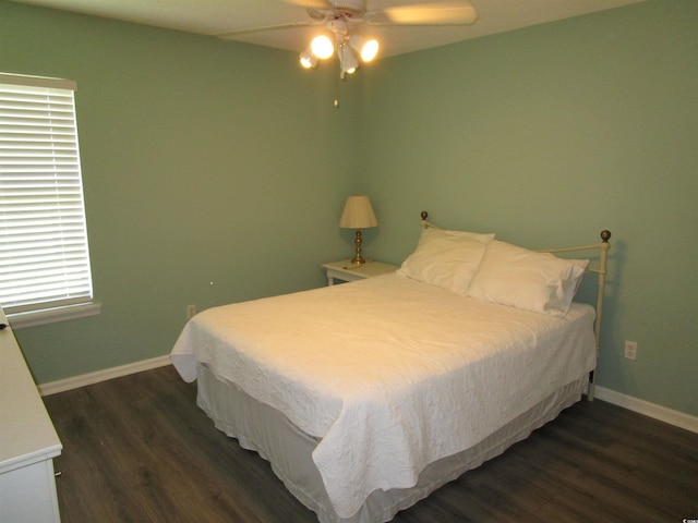 811 Rogers Rd, Myrtle Beach, SC 29577 - bedroom featuring dark wood finished floors, baseboards, and a ceiling fan