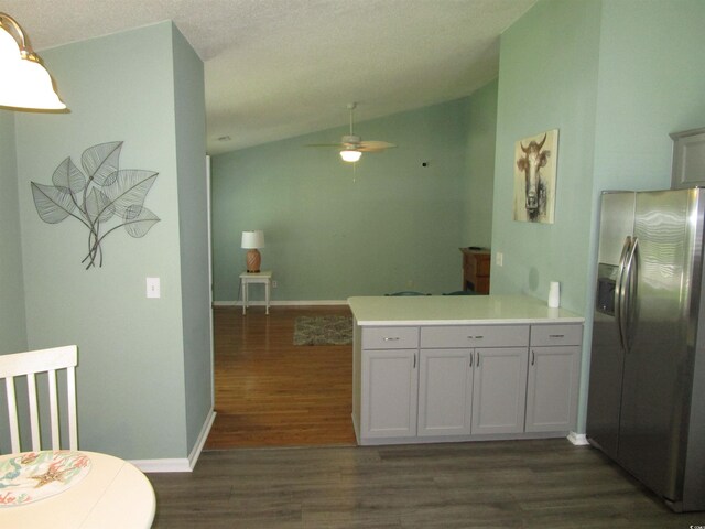 811 Rogers Rd, Myrtle Beach, SC 29577 - kitchen featuring stainless steel fridge, dark wood-style floors, lofted ceiling, a ceiling fan, and open floor plan