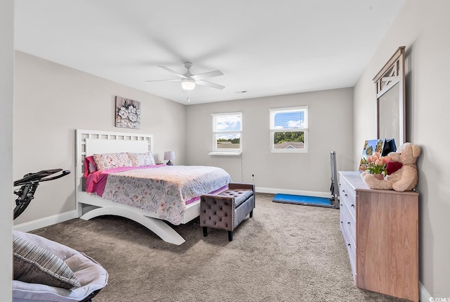 232 Je Edward Dr Unit 19, Myrtle Beach, SC 29588 - bedroom with baseboards, light carpet, and a ceiling fan