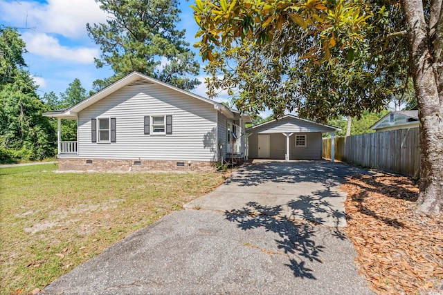 204 Elm St, Johnsonville, SC 29555 - view of front of house featuring driveway, crawl space, and a carport