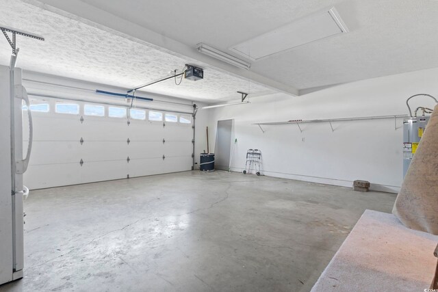 4012 Grousewood Dr, Myrtle Beach, SC 29588 - garage featuring a garage door opener, freestanding refrigerator, and electric water heater