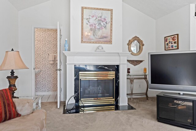 4012 Grousewood Dr, Myrtle Beach, SC 29588 - living area featuring vaulted ceiling, carpet flooring, a high end fireplace, and baseboards