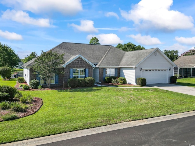 4012 Grousewood Dr, Myrtle Beach, SC 29588 - view of front facade featuring an attached garage, driveway, a front yard, and brick siding