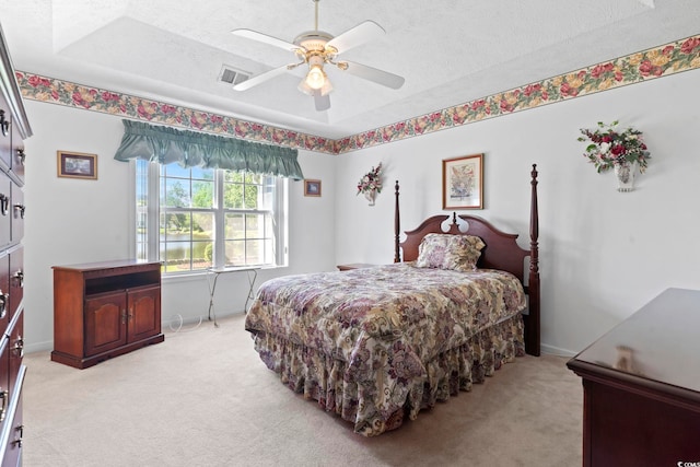 4012 Grousewood Dr, Myrtle Beach, SC 29588 - bedroom featuring light colored carpet, a raised ceiling, baseboards, ceiling fan, and a textured ceiling