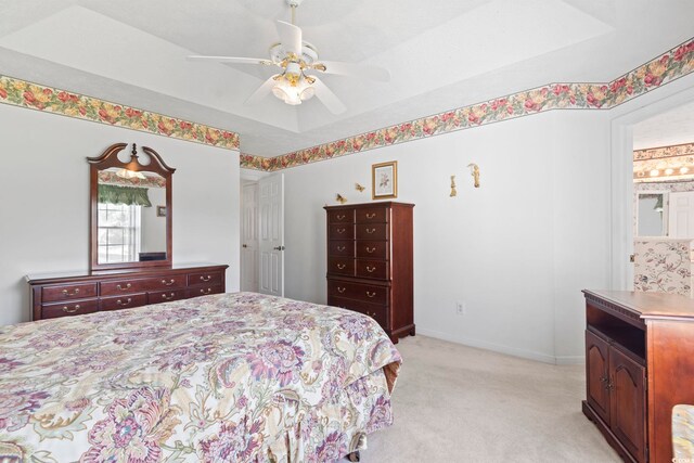 4012 Grousewood Dr, Myrtle Beach, SC 29588 - bedroom featuring light colored carpet, a ceiling fan, and baseboards